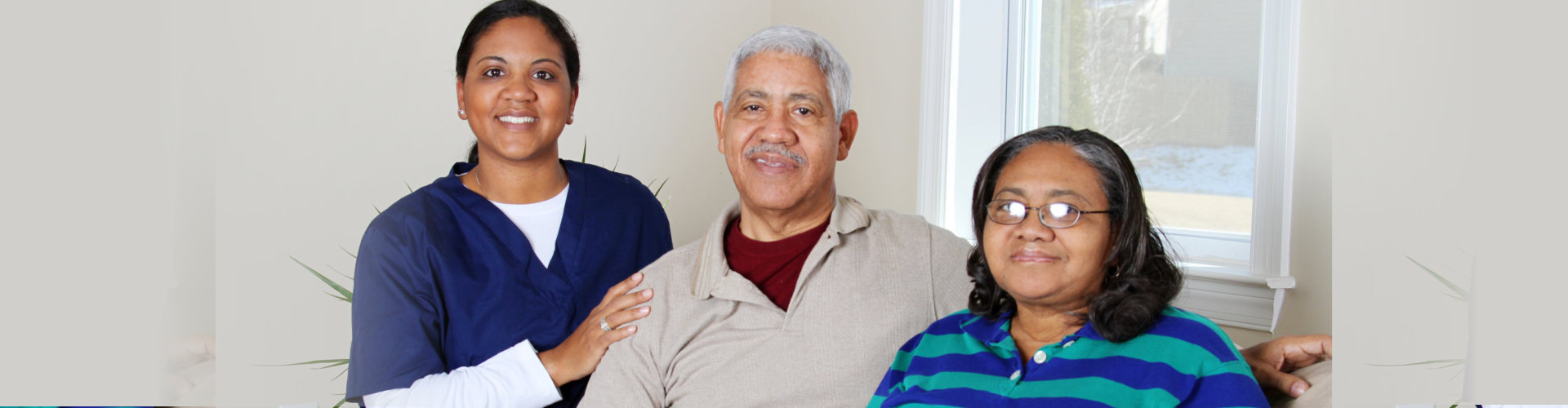 Home health care worker and an elderly couple