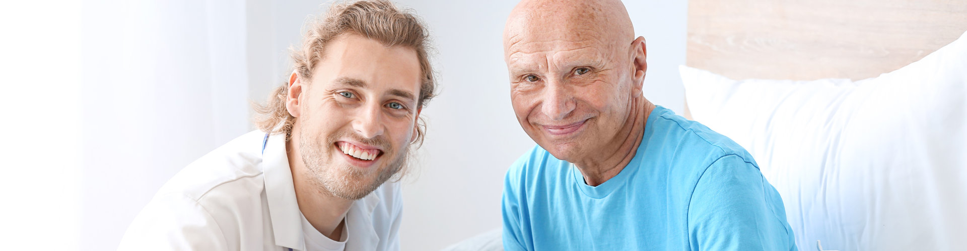elderly man and a caregiver